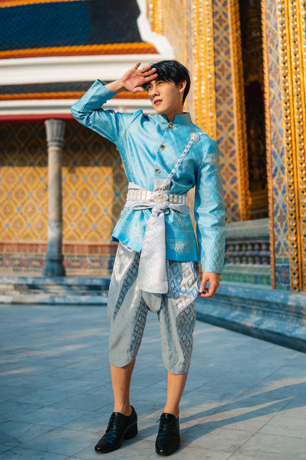 Visitor in Thai costume at temple